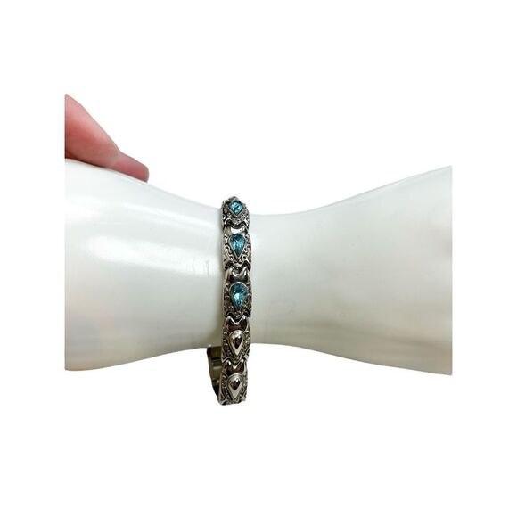 Silver linked bracket with blue tear drop crystal rhinestone accent - Picture 1 of 12